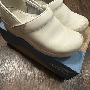 Dansko Off-White Leather Clogs
